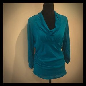 Cute ruched teal shirt, great for holiday parties!